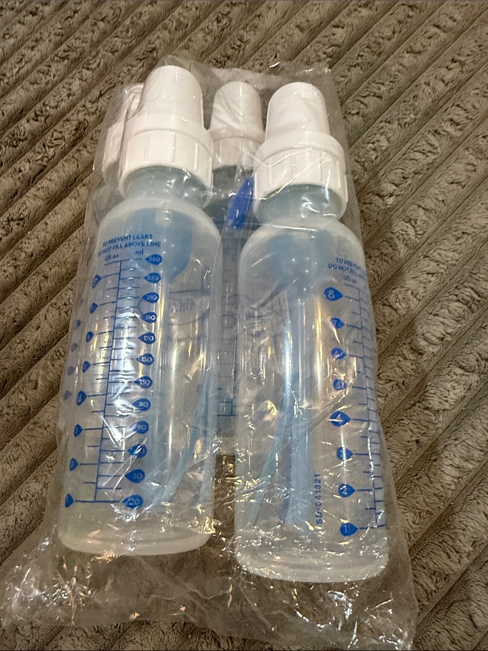 Clear Baby Feeding Bottles with White Nipples and Blue Markings - Pack of 4